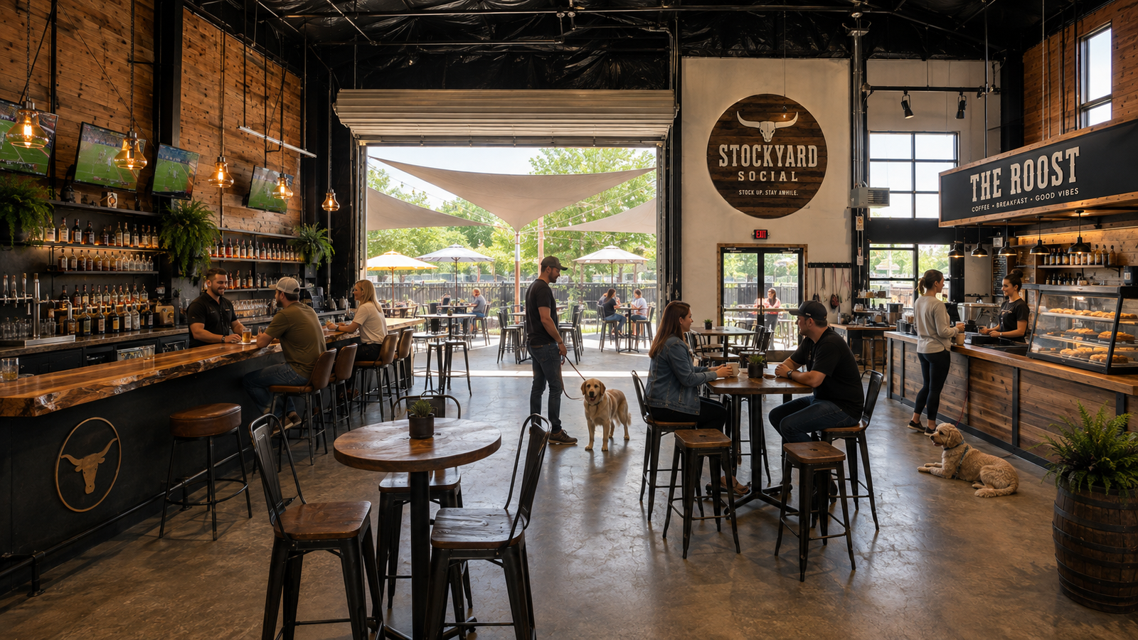 The Stockyard bar glowing at dusk with its front doors open to people and dogs